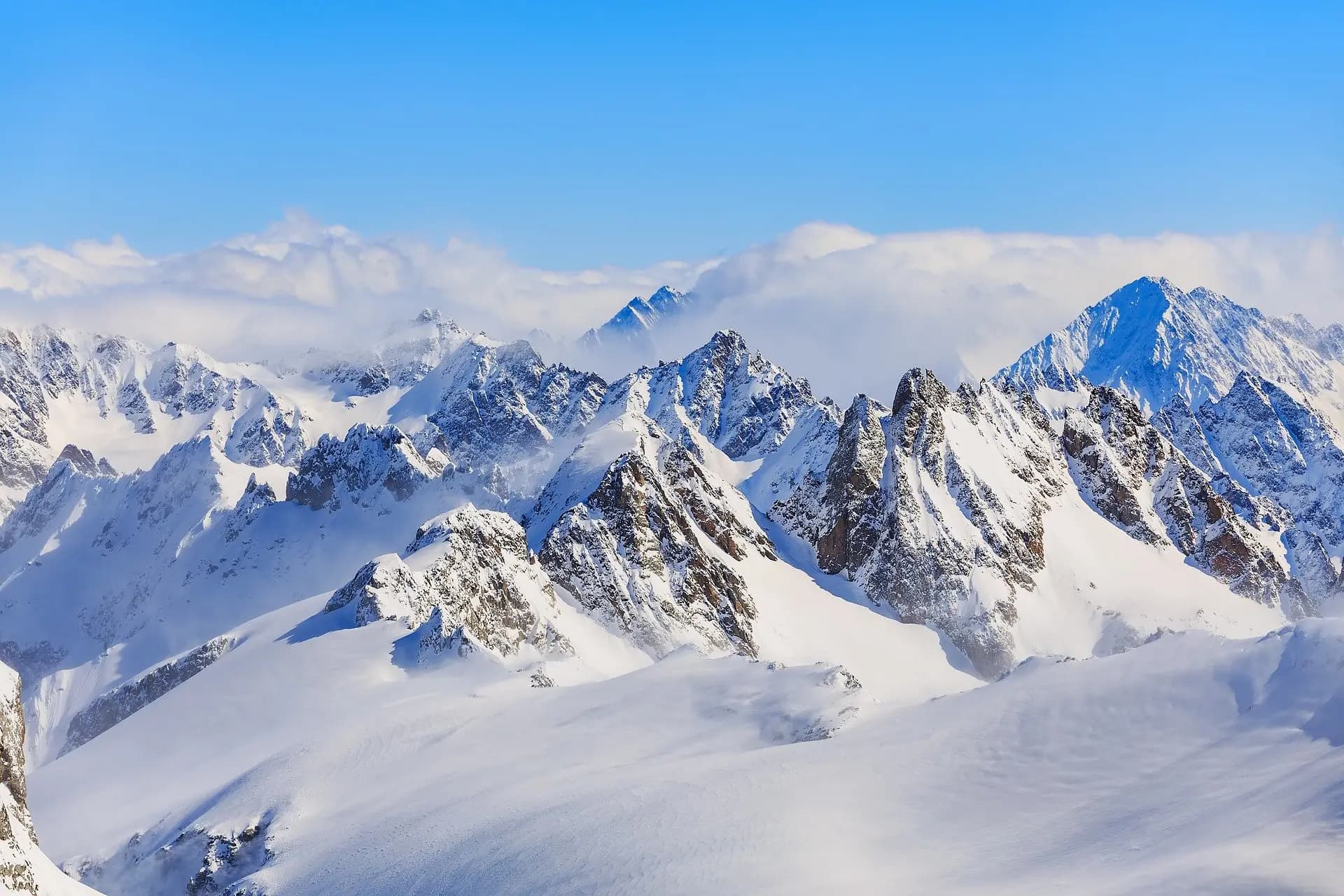 Snow-capped mountain peaks surrounding Mount Titlis